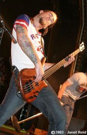 photo of Default bassist Dave Benedict copyright Janet Reid